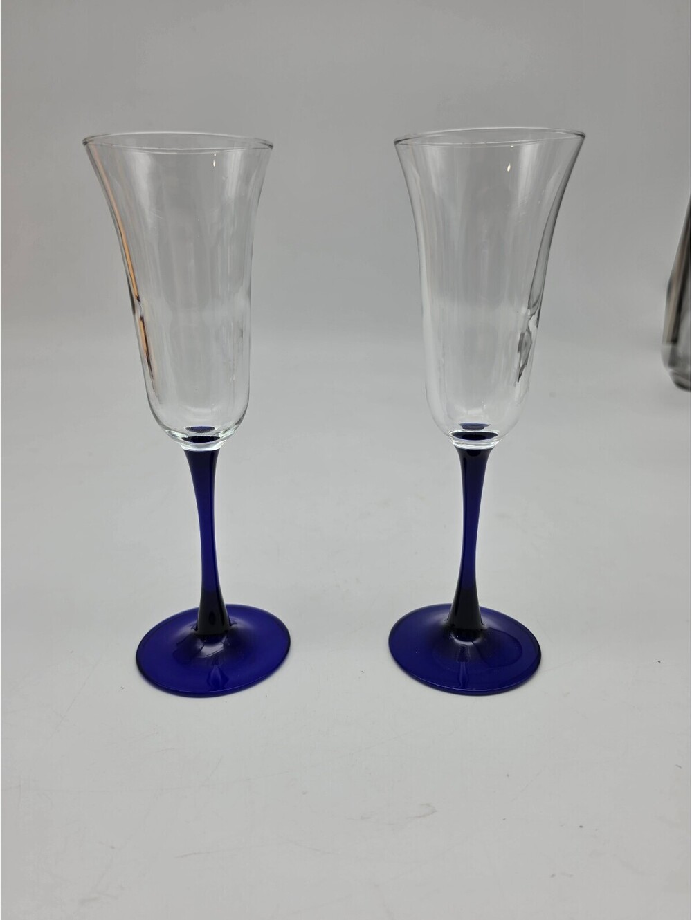 Set of 2 Blue Stem Clear Glass Champagne Flutes